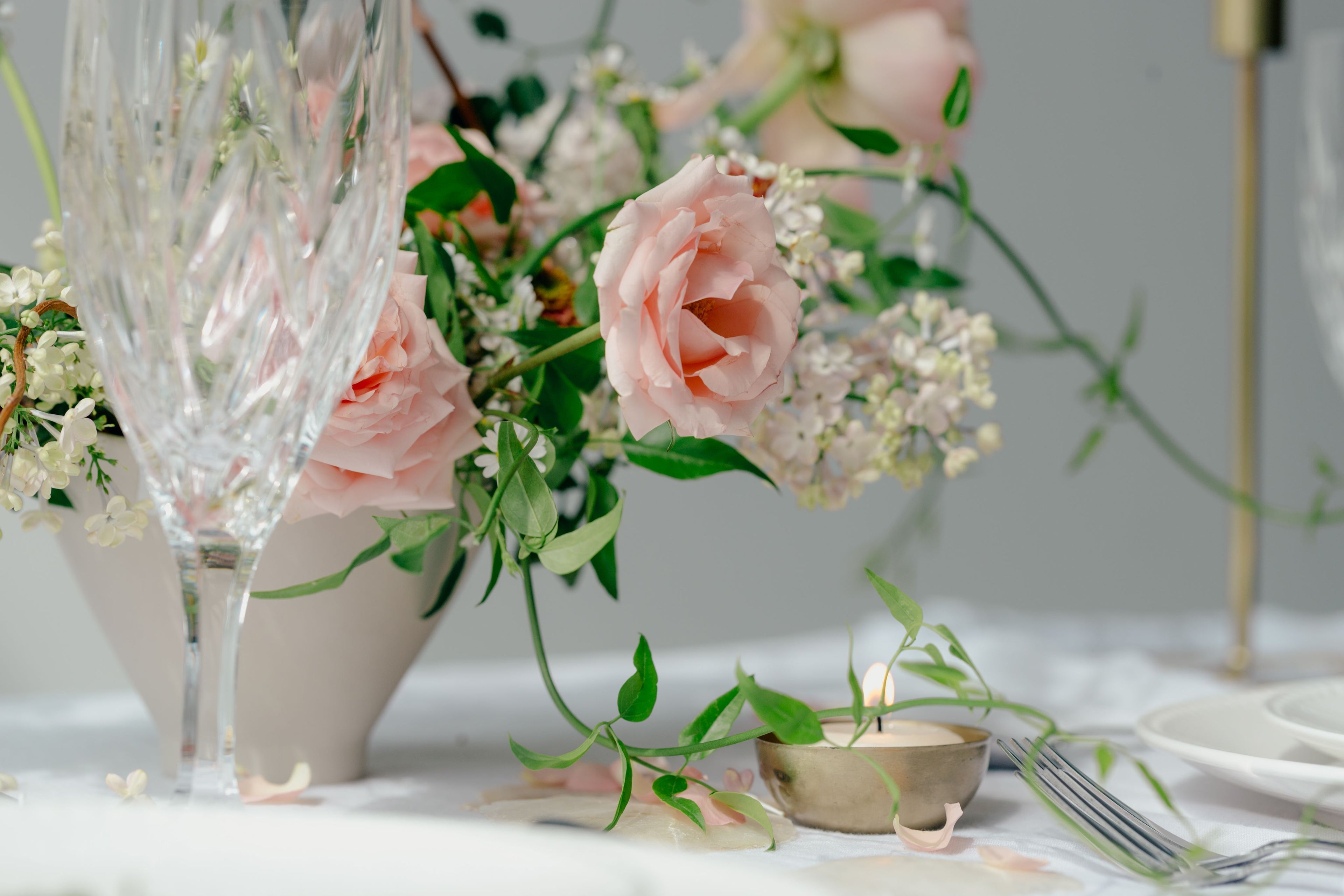 peach-roses-on-table-with-glass - Naturally_deliciousss