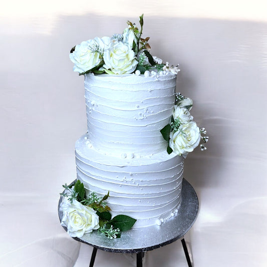 Wedding cake with white roses