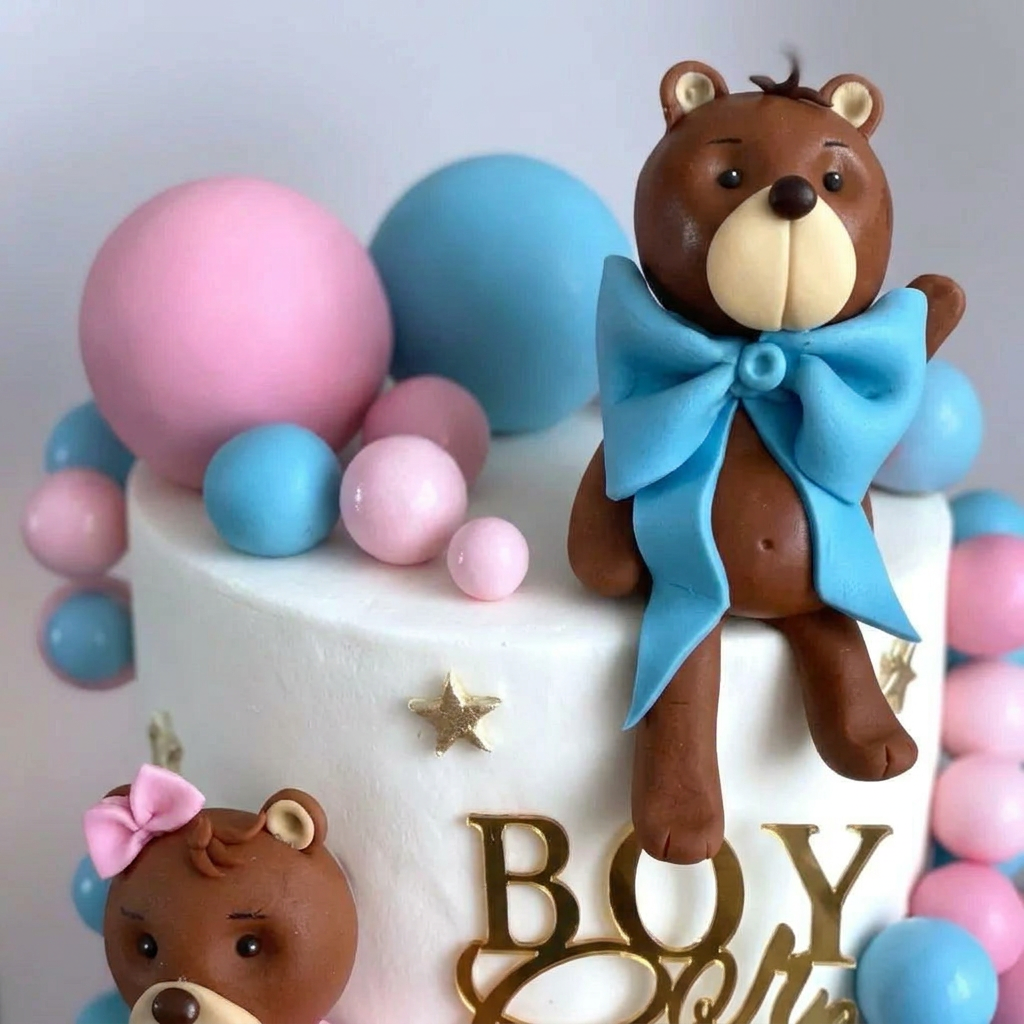 Close-up of teddy bear and cake details