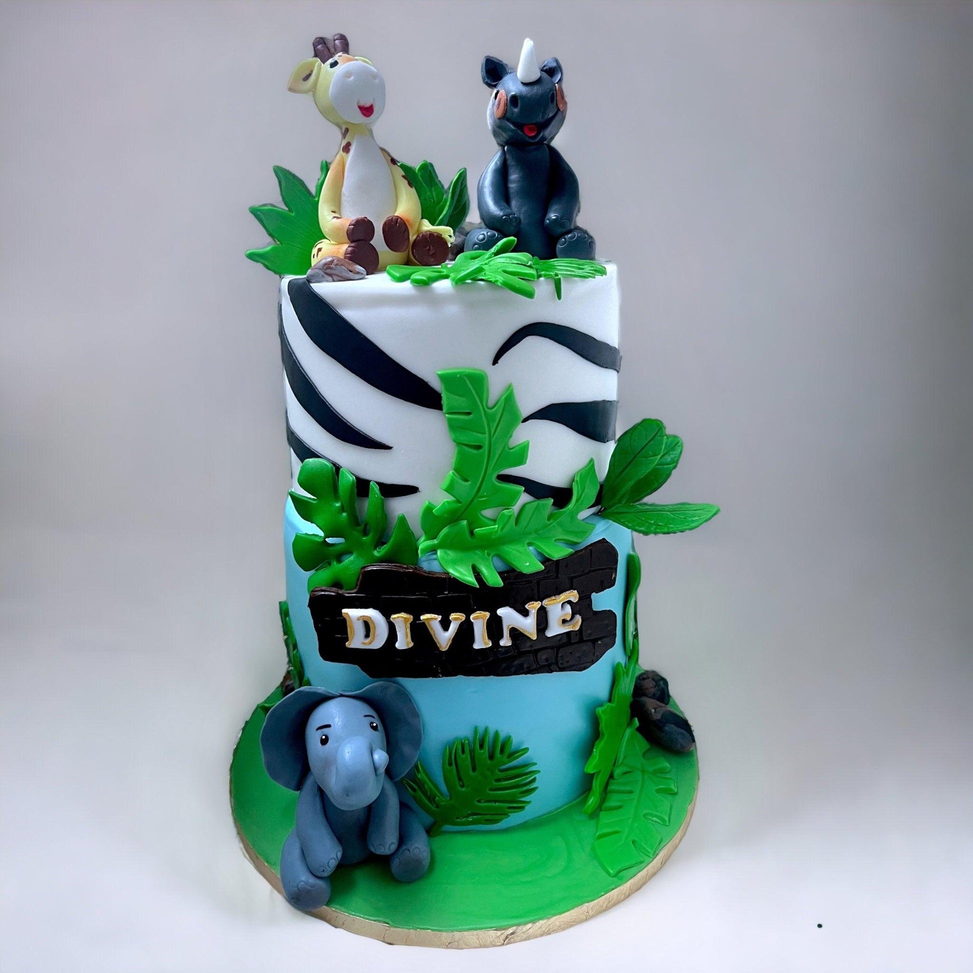 Safari birthday cake with three 3D topers. - Naturally_deliciousss